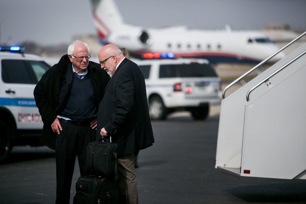 CHICAGO, IL - MARCH 15, 2015: Democratic presidential candidate Bernie Sanders speaks to campaign manager Jeff Weaver before boarding a flight to Arizona. CREDIT: Sam Hodgson for The New York Times.